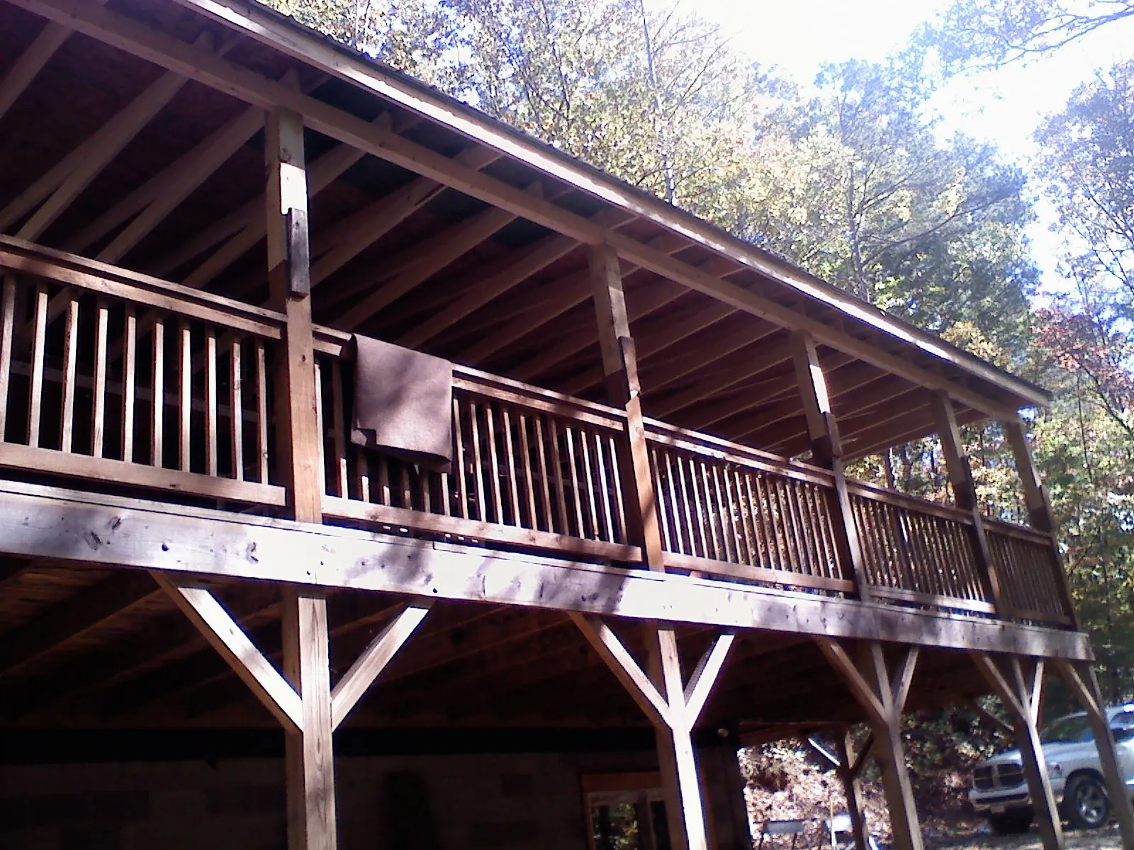 Timber framing under a new elevated porch and deck — Roof Leak Repair in Haverford by Roofing Brothers